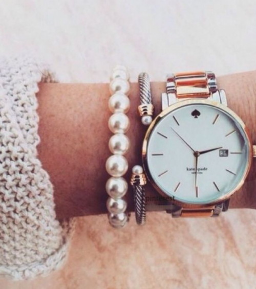 Rose gold watch and pearl and silver bracelet