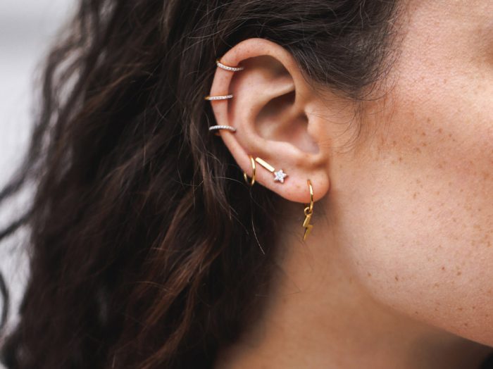 stud earrings in gold and silver