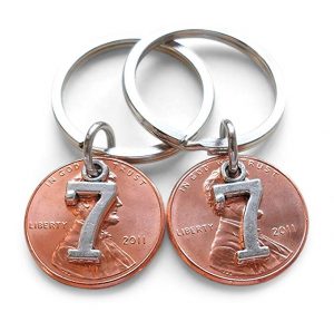 Penny key chains with number seven on them