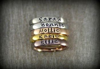4.4 out of 5 stars 395 customer reviews | 28 answered questions Personalized Stackable Name Ring - Stacking Rings - Matte, Shiny, Rose Gold, Gold and Coffee Colors - 3mm Width Previous page Next page New to our product line are these nice Stainless Steel Stackable Name Rings, they are available in Matte, Shiny, Rose Gold, Gold and Coffee colors Stainless Steel. Each ring is personalized with your choice of wording and/or dates. The rings are made of Stainless Steel that will not fade, tarnish or stain your skin. Rose Gold, Gold and Coffee colors are plated over Stainless Steel. Each ring is 3mm wide, the perfect width for stacking! **LISTING IS FOR 1 RING** ( Picture shows five individual rings which are sold separately) Change Quantity to desired number of rings and add to cart separately ****INSIDE ENGRAVING NOT AVAILABLE FOR THIS RING**** ------------ORDERING INSTRUCTIONS--------------- 1. Select Quantity 2. Select Color 3. Select Size 4. Enter personalization (35 characters max.) **Please note: Paint in rings is not permanent and will come out over time, length will vary depending on wear of ring. This can easily be repainted at any time using a paint marker and wiping excess with alcohol. Unfortunately, there is not a way to make it permanent in stainless steel, however the engraving (stamping) will always be there** Price: $14.95 + $33.95 shipping In Stock. Usually takes between 1 and 2 days to create Ships from and sold by Simple Xpressions. This item ships to Croatia. Get it by Friday, March 15 - Wednesday, March 20 Choose this date at checkout. Select Options Select from 4 options Deliver to Croatia Qty: Qty:1 Add to Cart Add to List Simple Xpressions Personalized Hand Stamped Jewelry in Illinois Contact me with general inquiries Share 240+ Shares Are you an Artisan? Apply to join Handmade at Amazon