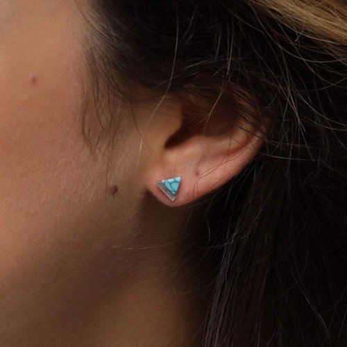 Turquoise stud on a girl